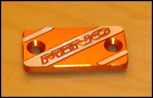 MINO :  ( 30-3011 ) Handbrake cil cover KTM
